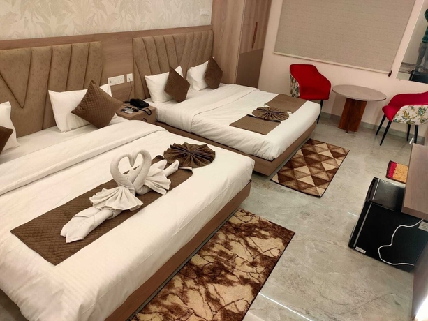 Imagen de la habitación del Hotel Aaditri Inn. Foto 7