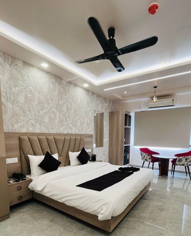 Imagen de la habitación del Hotel Aaditri Inn. Foto 8