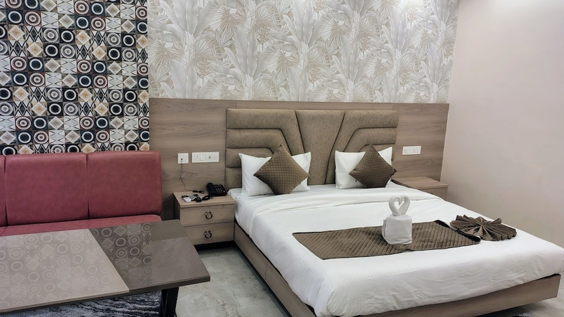 Imagen de la habitación del Hotel Aaditri Inn. Foto 10