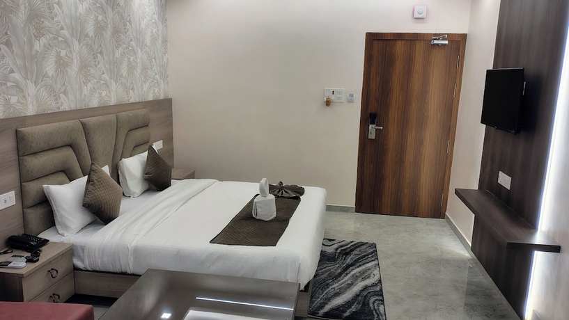 Imagen de la habitación del Hotel Aaditri Inn. Foto 11