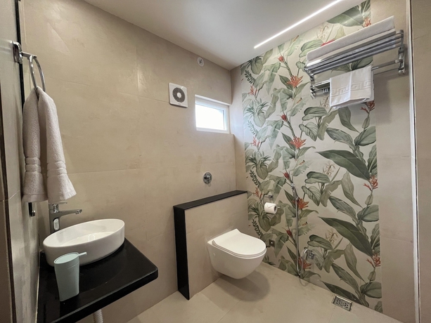 Imagen de la habitación del Hotel Aaditri Inn. Foto 12