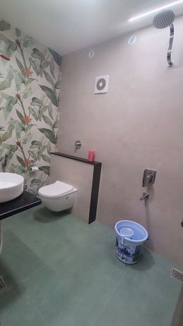 Imagen de la habitación del Hotel Aaditri Inn. Foto 13