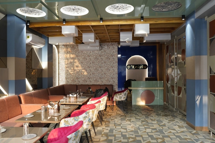 Imagen del bar/restaurante del Hotel Aaditri Inn. Foto 4