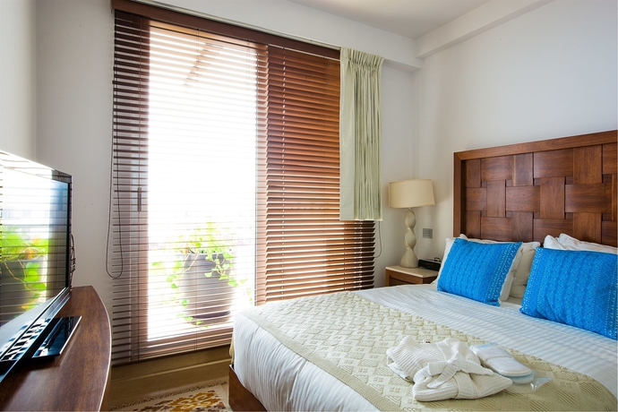 Imagen de la habitación del Hotel Aak-bal All Suite Resort. Foto 4