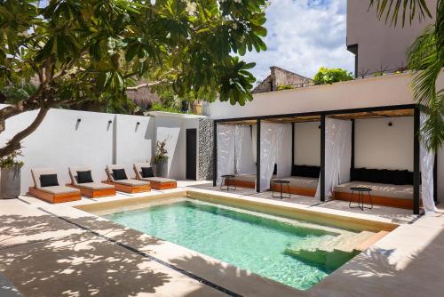 Imagen de la habitación del Hotel Aalada Playa Del Carmen. Foto 15