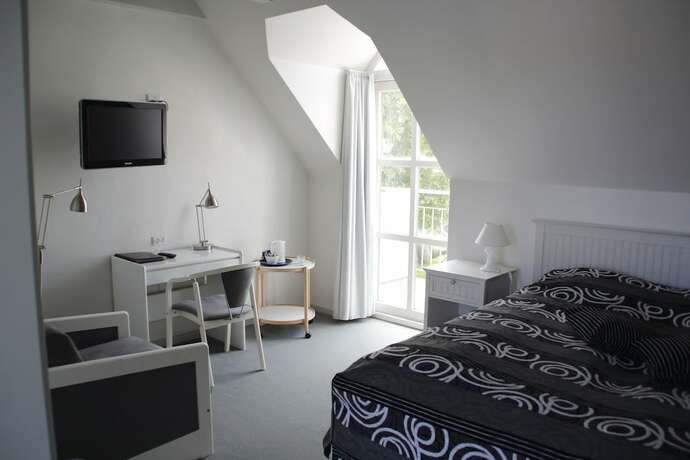 Imagen de la habitación del Hotel Aalbæk Badehotel. Foto 35