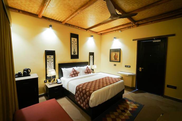 Imagen de la habitación del Hotel Aamaghati Wildlife Resort. Foto 12