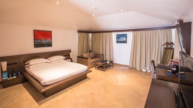 Imagen de la habitación del Hotel Aamby Valley City. Foto 14