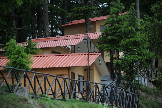Imagen de la habitación del Hotel Aamod Dalhousie. Foto 19