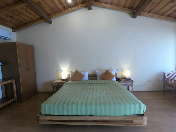 Imagen de la habitación del Hotel Aamod Monolith Resort Bhimtal. Foto 13