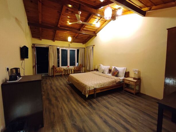 Imagen de la habitación del Hotel Aamod Monolith Resort Bhimtal. Foto 15