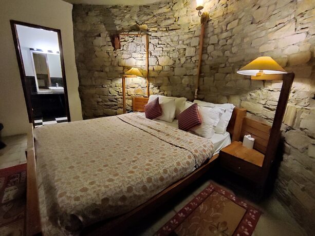 Imagen de la habitación del Hotel Aamod Monolith Resort Bhimtal. Foto 18