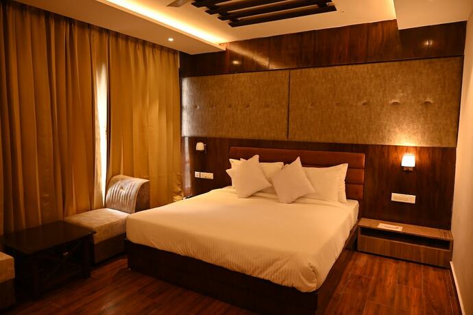 Imagen de la habitación del Hotel Aamod Suites - Dalhousie. Foto 16
