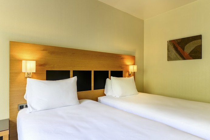 Imagen de la habitación del Hotel A&O Brussels Centrum. Foto 8