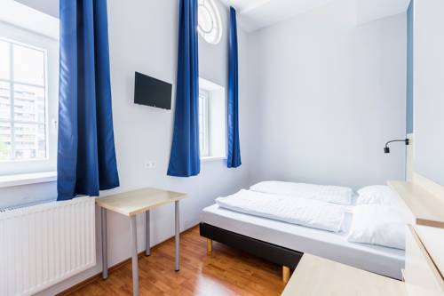 Imagen de la habitación del Hotel A&O Salzburg Hauptbahnhof. Foto 3