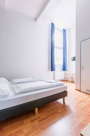 Imagen de la habitación del Hotel A&O Salzburg Hauptbahnhof. Foto 7