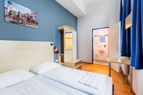 Imagen de la habitación del Hotel A&O Salzburg Hauptbahnhof. Foto 8