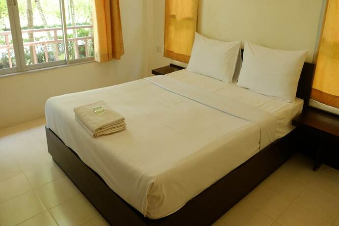 Imagen de la habitación del Hotel Aana Residence Resort. Foto 18
