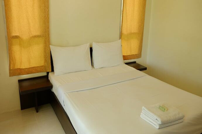 Imagen de la habitación del Hotel Aana Residence Resort. Foto 20