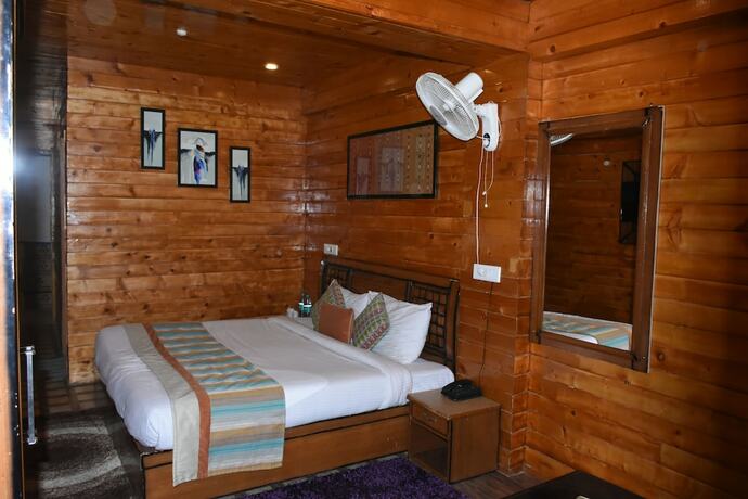 Imagen de la habitación del Hotel Aanantham Country Resort. Foto 19