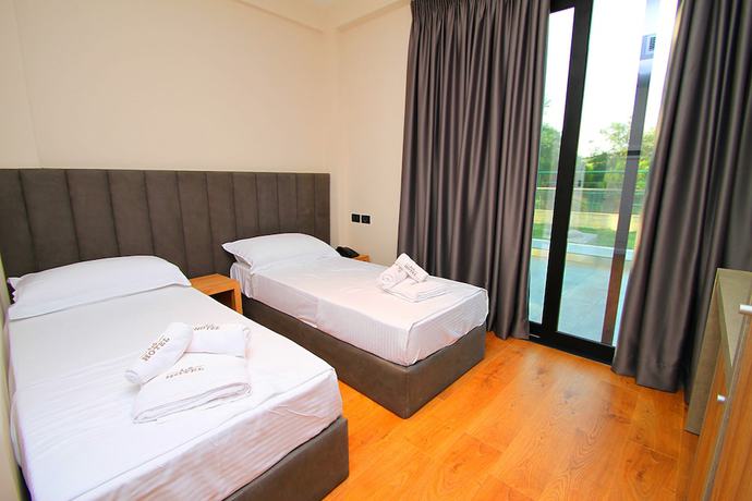Imagen de la habitación del Hotel AandG. Foto 8
