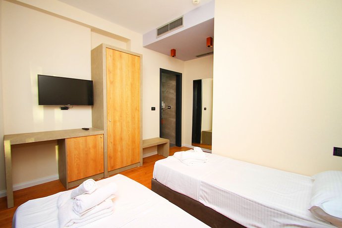 Imagen de la habitación del Hotel AandG. Foto 11