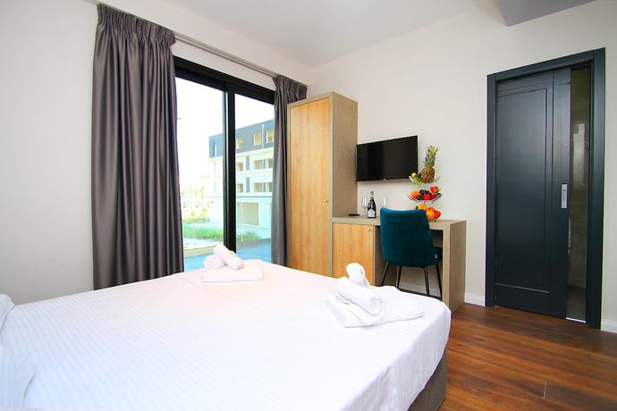 Imagen de la habitación del Hotel AandG. Foto 12