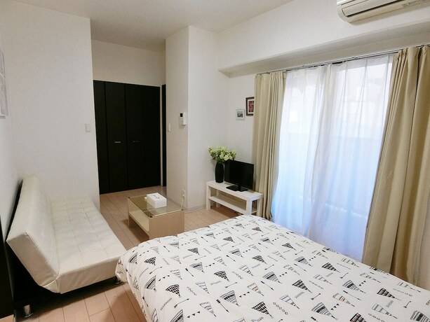 Imagen de la habitación del Hotel Aandc Stay Dotonbori. Foto 22