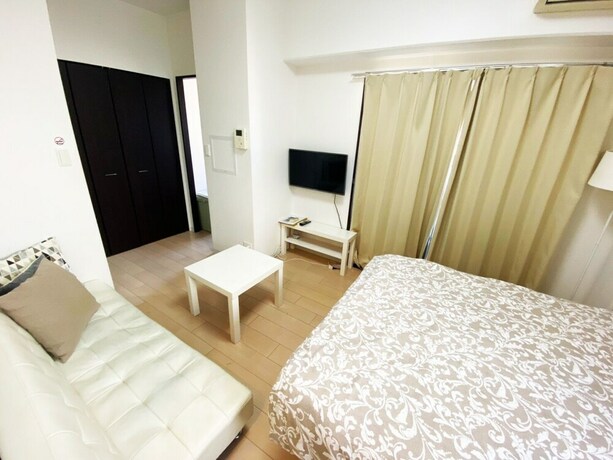 Imagen de la habitación del Hotel Aandc Stay Dotonbori. Foto 24