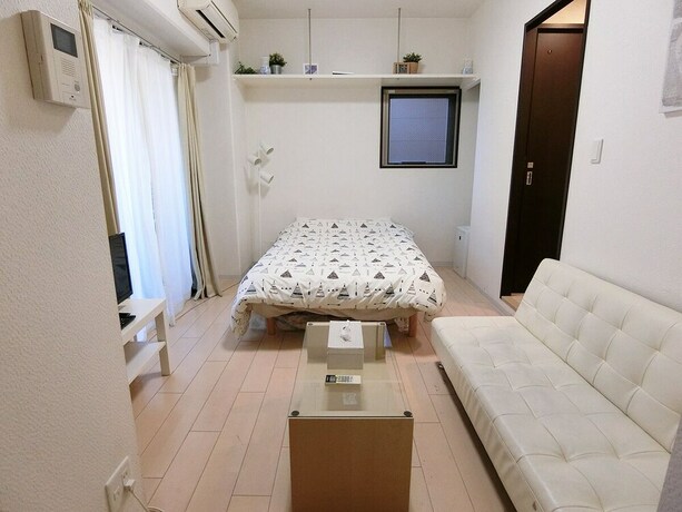 Imagen de la habitación del Hotel Aandc Stay Dotonbori. Foto 28
