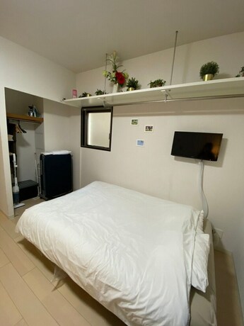 Imagen de la habitación del Hotel Aandc Stay Dotonbori. Foto 29