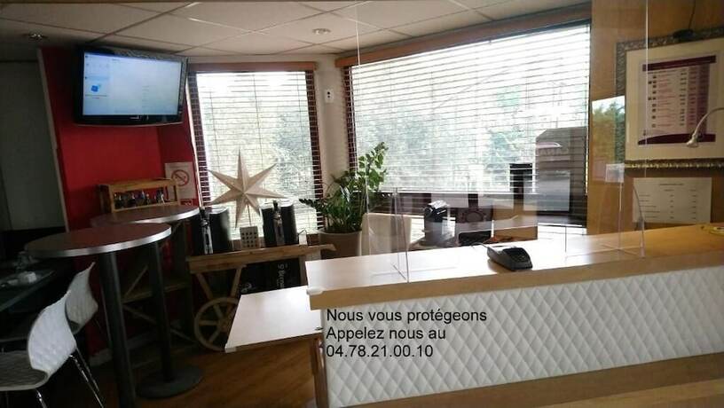 Imagen del bar/restaurante del Hotel Aandh Privil&egrave;ge Lyon Est - Saint Priest Eurexpo. Foto 13