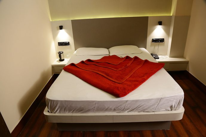 Imagen de la habitación del Hotel Aangan Regency. Foto 12