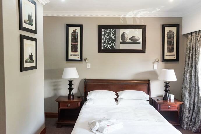 Imagen de la habitación del Hotel Aanmani Boutique Residence. Foto 19