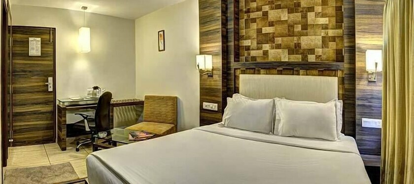 Imagen de la habitación del Hotel Aaram Orchard. Foto 15