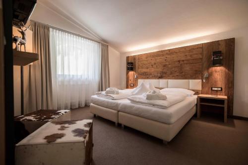 Imagen de la habitación del Hotel Aaritz, Selva di Val Gardena. Foto 16