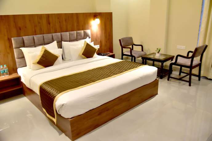 Imagen de la habitación del Hotel Aarna. Foto 16