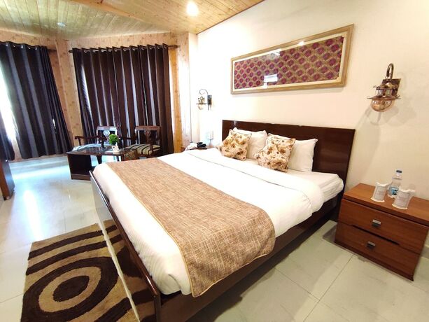 Imagen de la habitación del Hotel Aaroham By Aamod Dharamshala. Foto 19