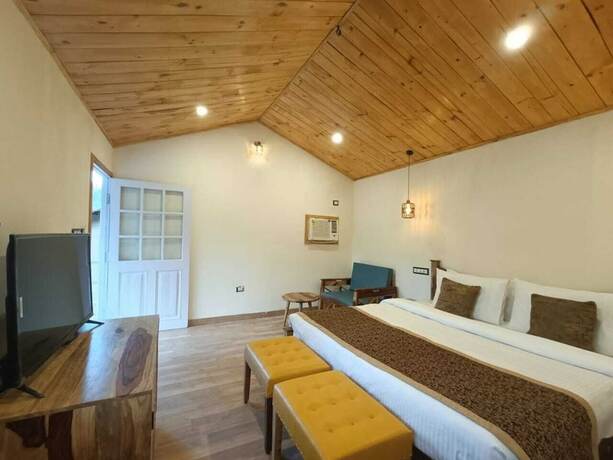 Imagen de la habitación del Hotel Aaroham Resorts Shimla. Foto 11
