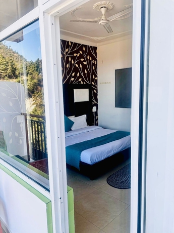 Imagen de la habitación del Hotel Aaroham Retreat. Foto 14