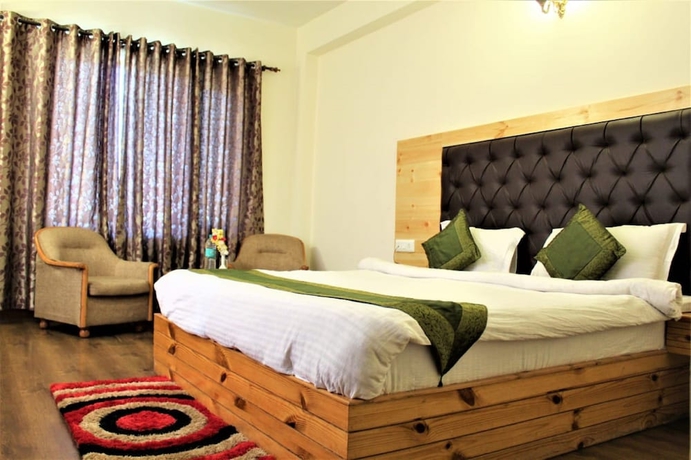 Imagen de la habitación del Hotel Aash Manali Retreat Spa and Resort. Foto 5