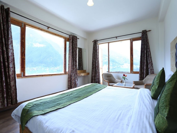 Imagen de los interiores del Hotel Aash Manali Retreat Spa and Resort. Foto 7