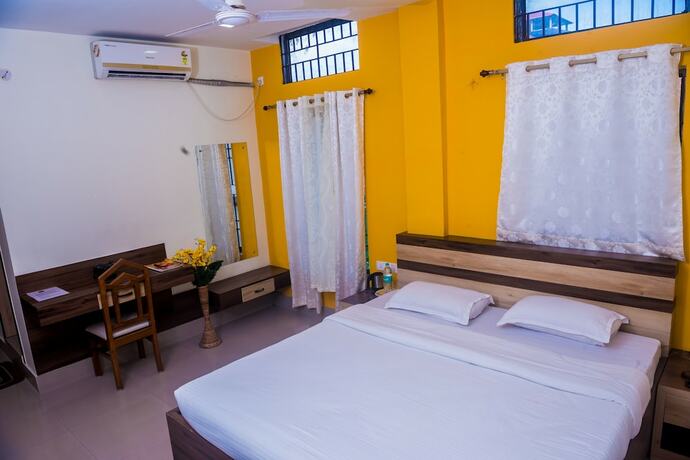 Imagen de la habitación del Hotel Aatreyee. Foto 18