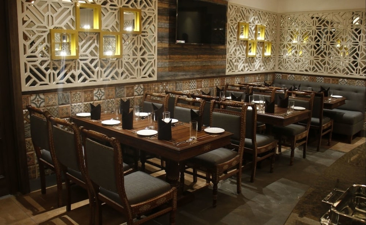 Imagen del bar/restaurante del Hotel Ab Clarks Inn Jalandhar. Foto 6