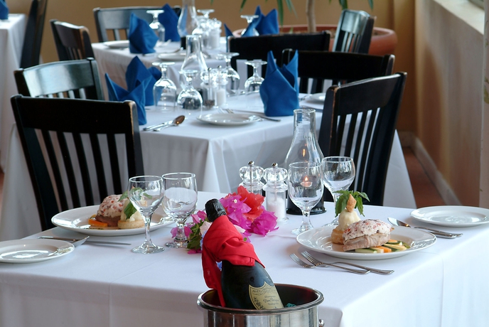 Imagen del bar/restaurante del Hotel Abaco Beach Resort and Boat Harbour Marina. Foto 5