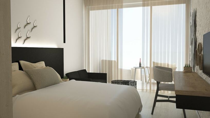 Imagen de la habitación del Hotel Abacus Suites. Foto 19