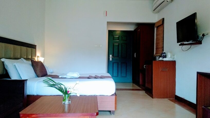 Imagen de la habitación del Hotel Abad Greenforest Thekkady. Foto 17