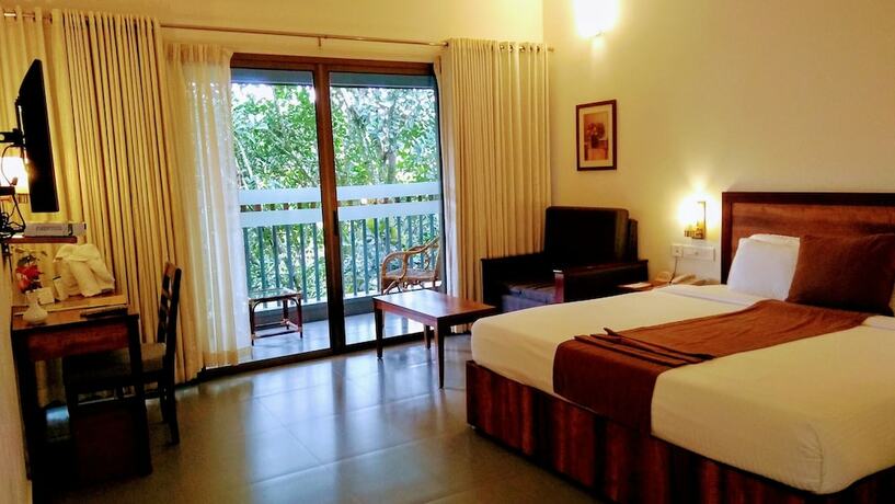 Imagen de la habitación del Hotel Abad Greenforest Thekkady. Foto 20