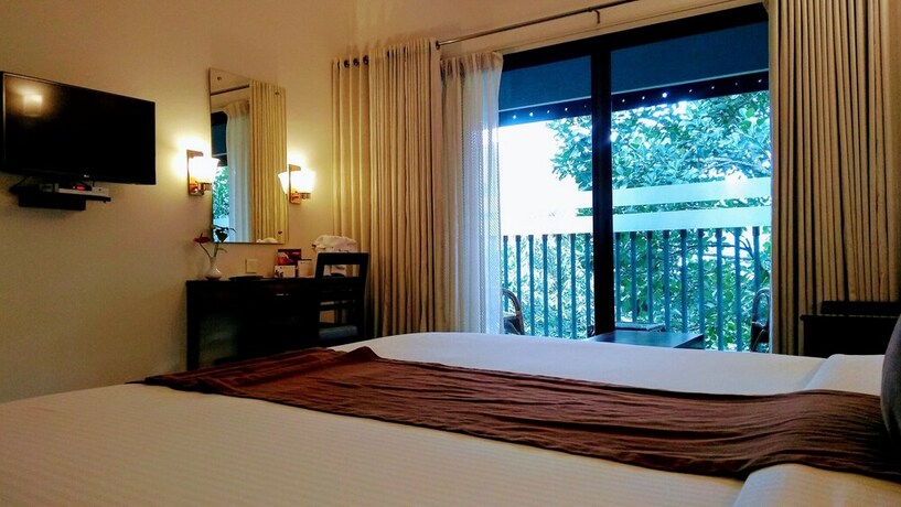 Imagen de la habitación del Hotel Abad Greenforest Thekkady. Foto 21