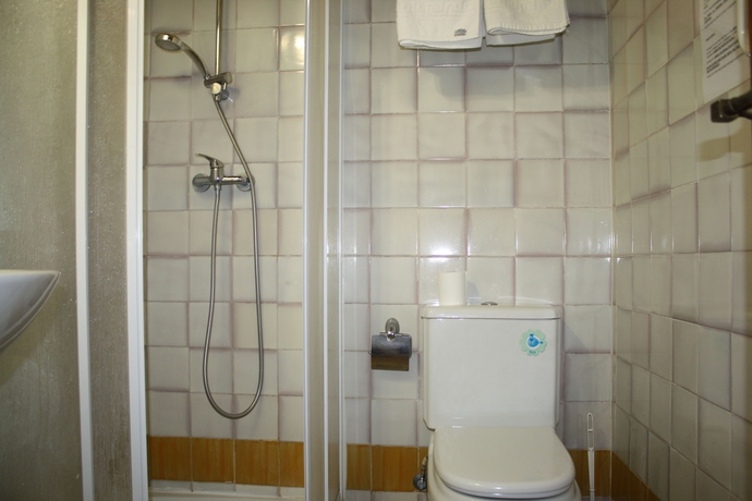 Imagen de la habitación del Hotel Abadia Suites. Foto 7